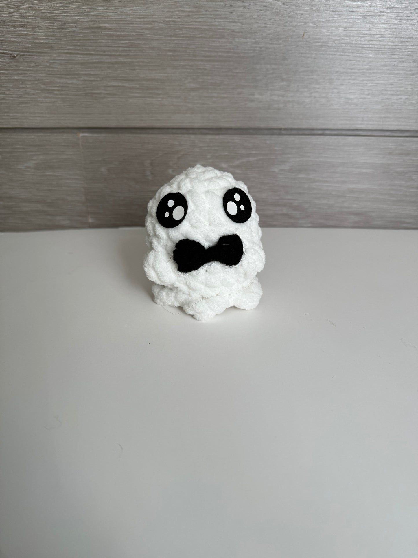 Echo the Ghost with bow tie